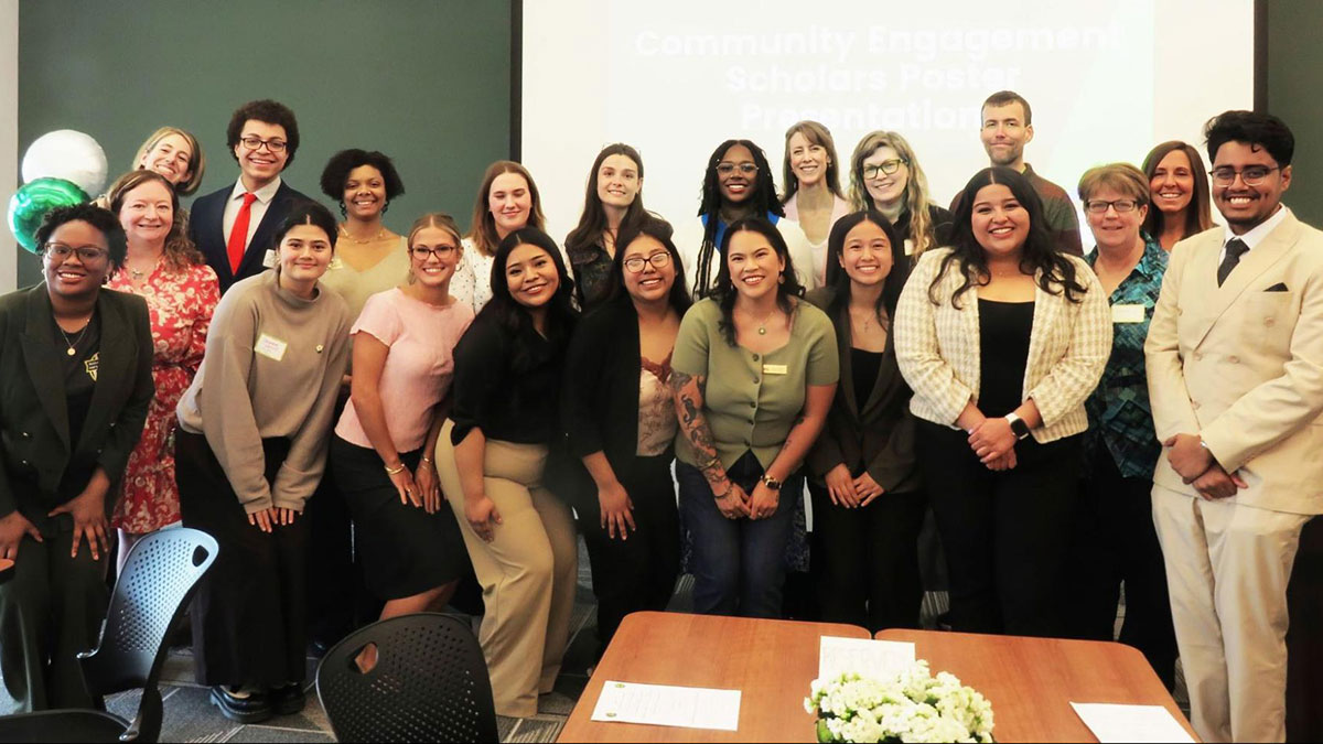 A group photo of the 2025-2026 CESP cohort and community partners at the annual CESP showcase on April 17, 2026 at the MSUFCU Community Room.