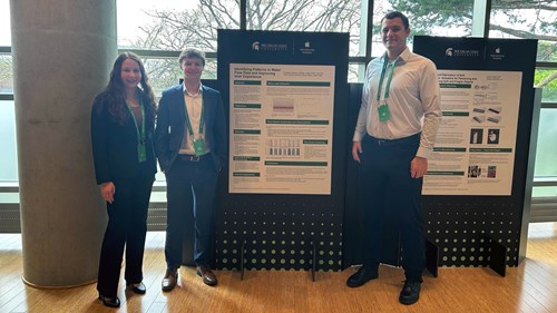 Students (Left to Right) Mia Kunath, Ethan Fremder, and Colby Degan present their project poster, titled “Identifying Patterns in Water Flow Data and Improving User Experience.” They partnered with the Bradford White Corporation to detect leaks in water heaters and improve water usage efficiency for consumers.