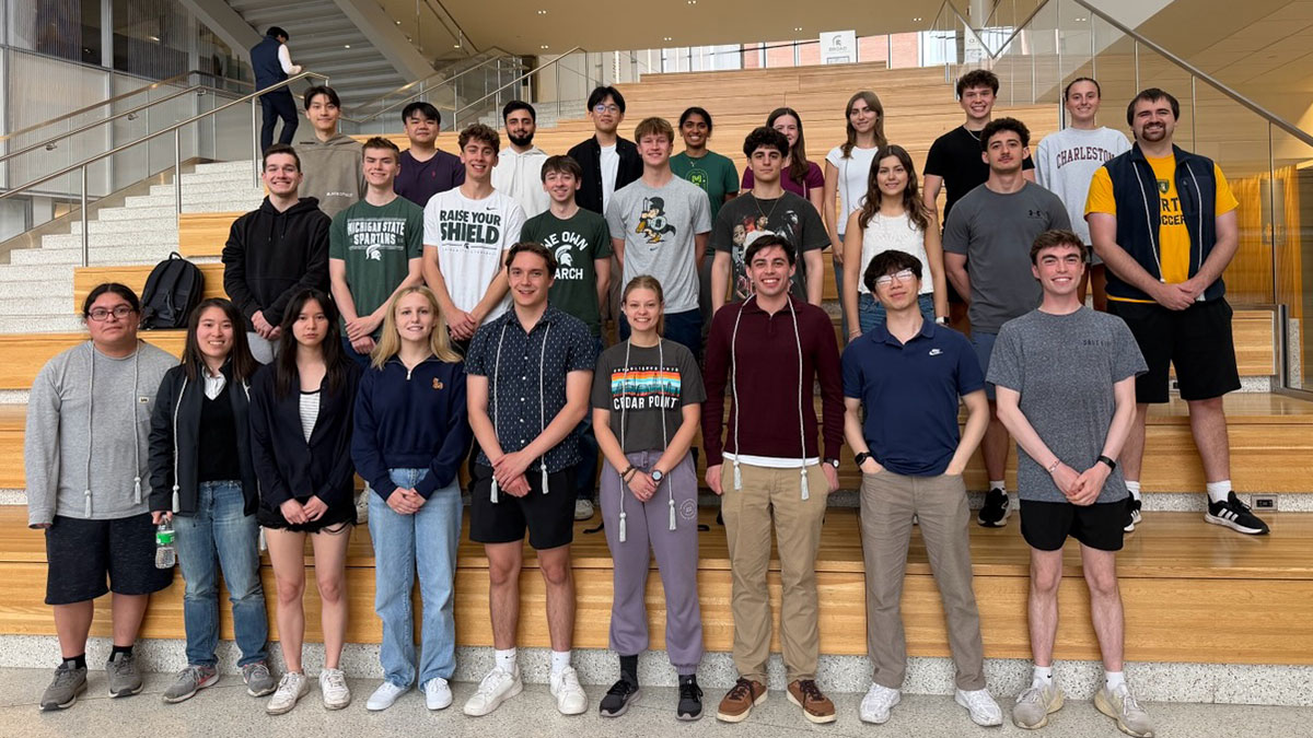 A group photo of 2025-2026 MSU VITA volunteers in the Minskoff Pavilion.